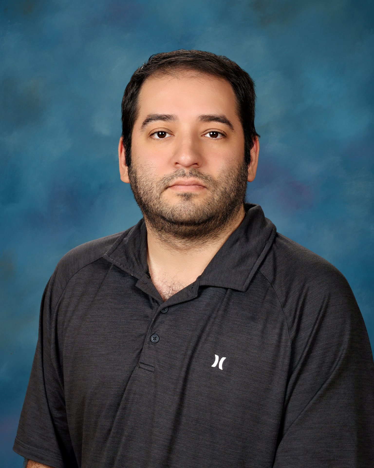 Portrait of Eric Guerra, IT Technical Service Specialist